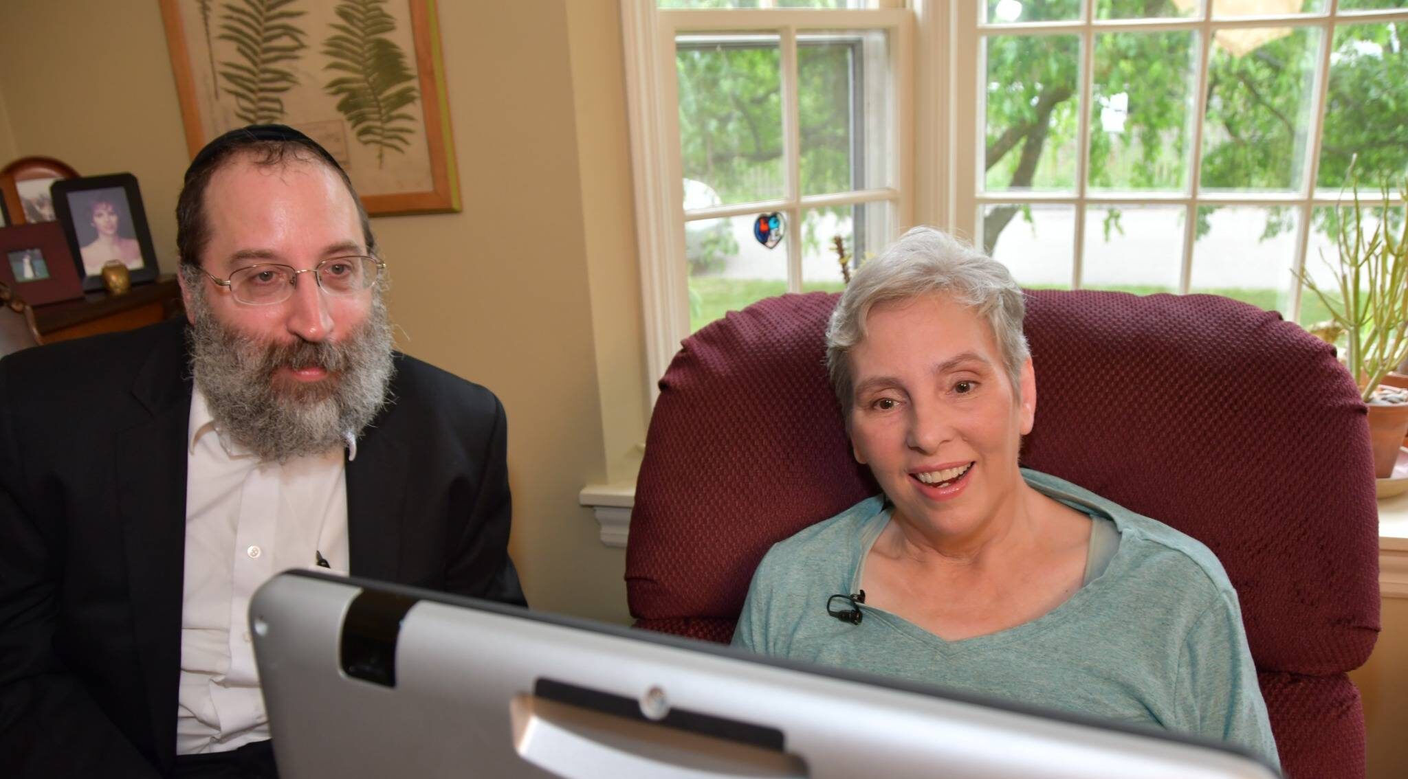 Bridging Voice specialist assisting person with ALS